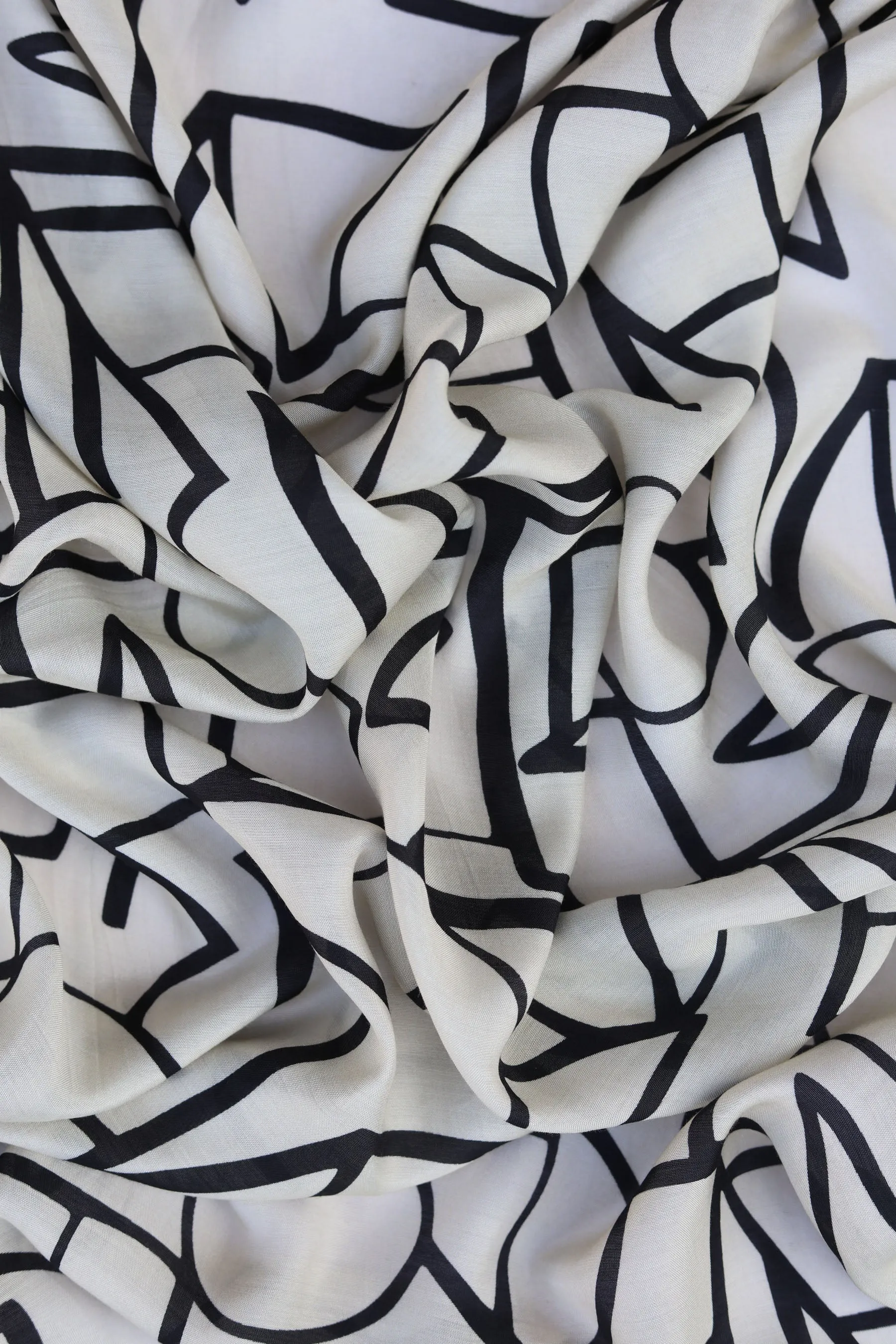 Black Geometric Pattern Printed Natural Muslin Silk Fabric