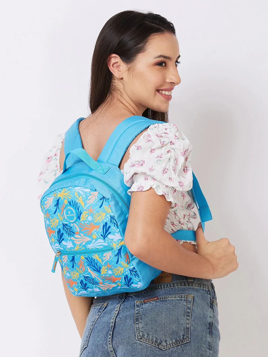 Caprese Xenia Backpack Small Light Blue Printed