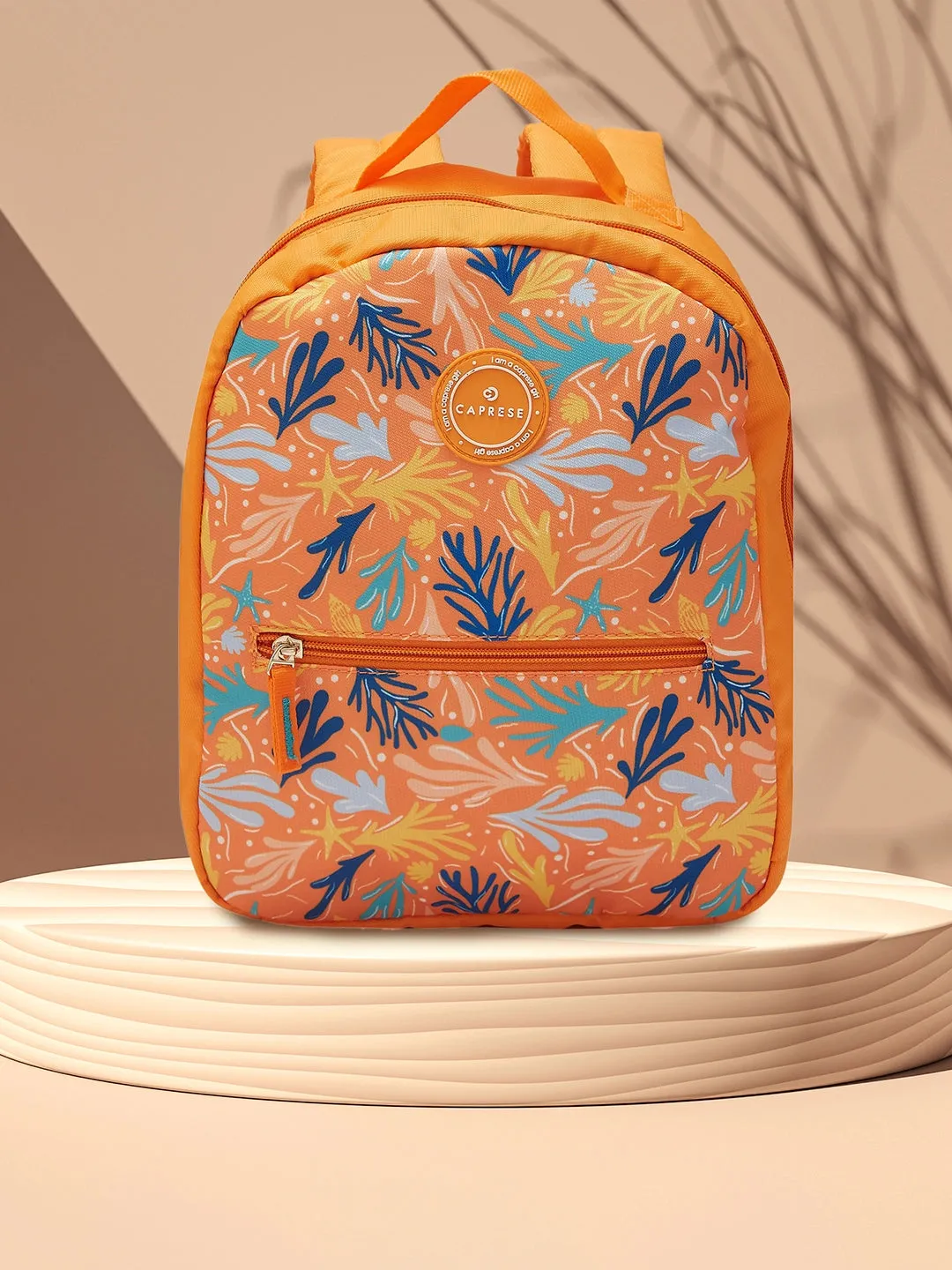 Caprese Xenia Backpack Small Orange Printed