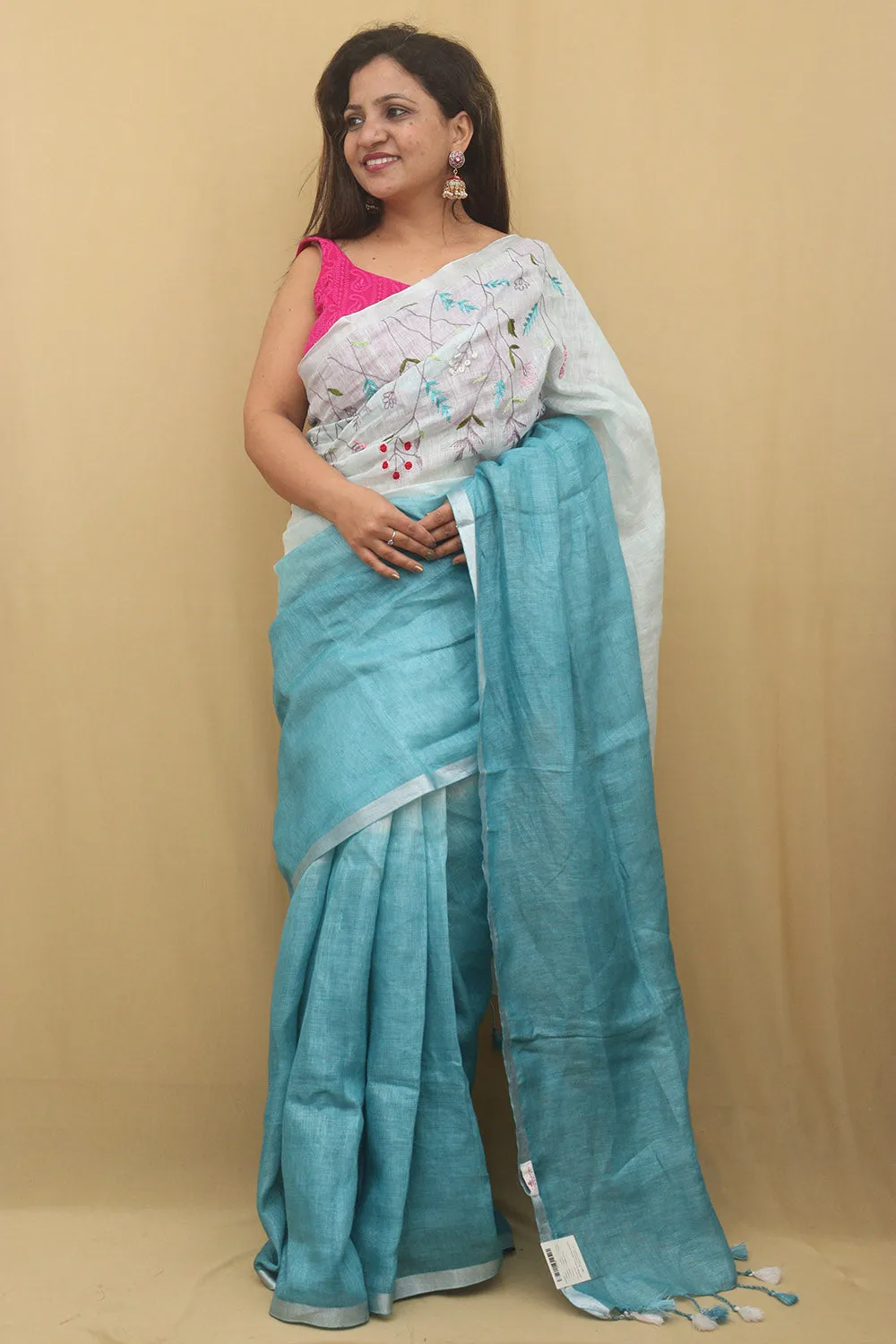 Elegant Blue Linen Saree with Intricate Embroidery