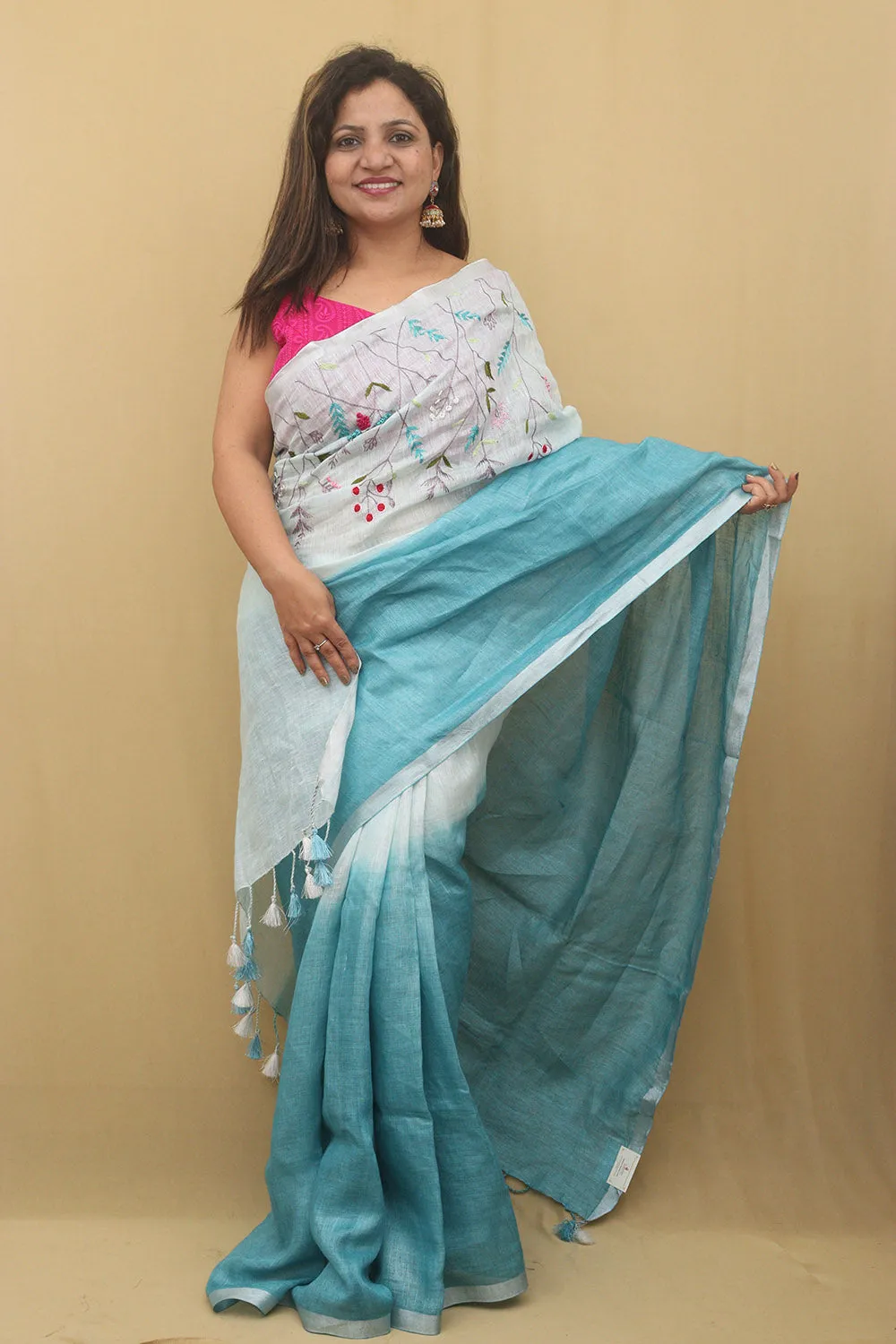 Elegant Blue Linen Saree with Intricate Embroidery