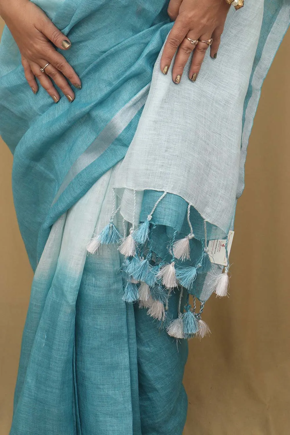 Elegant Blue Linen Saree with Intricate Embroidery