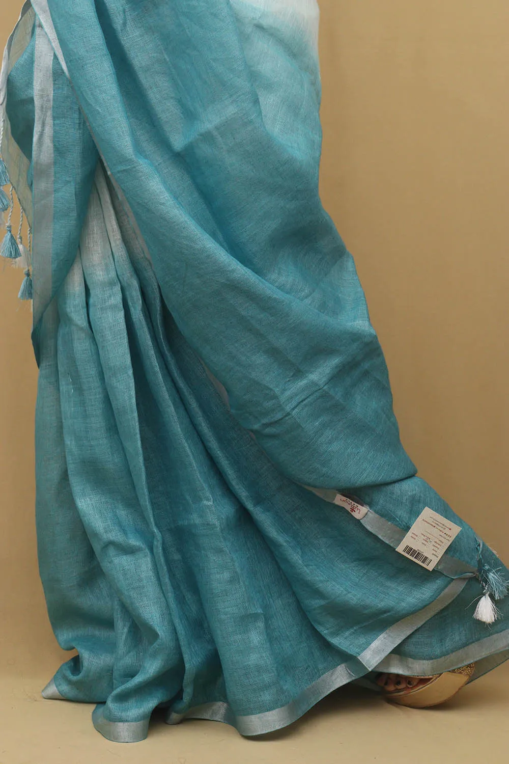 Elegant Blue Linen Saree with Intricate Embroidery