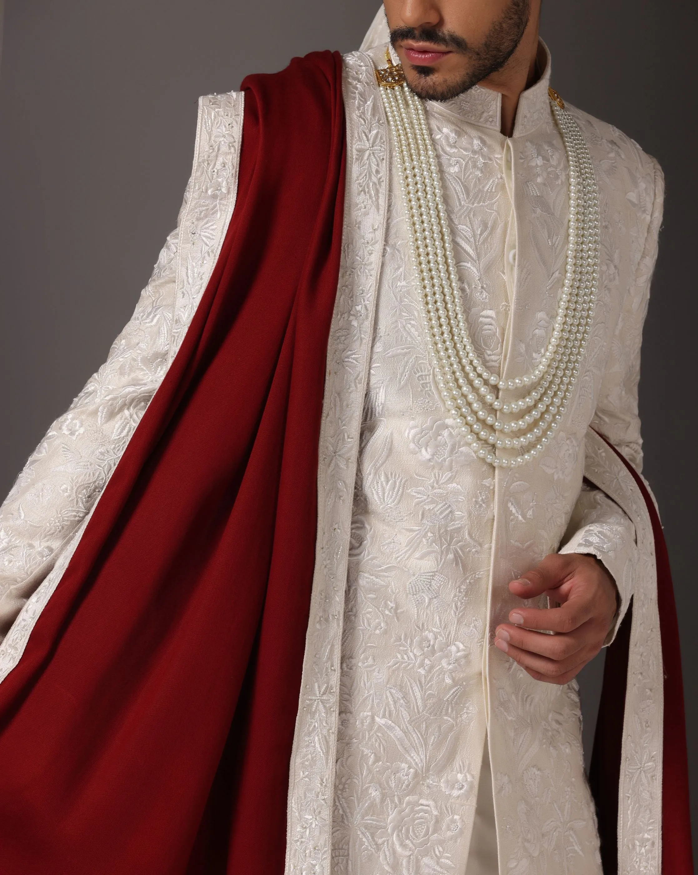 Ivory Grandeur: Sherwani with Subtle Tone-on-Tone Work and Handcrafted Embellishments