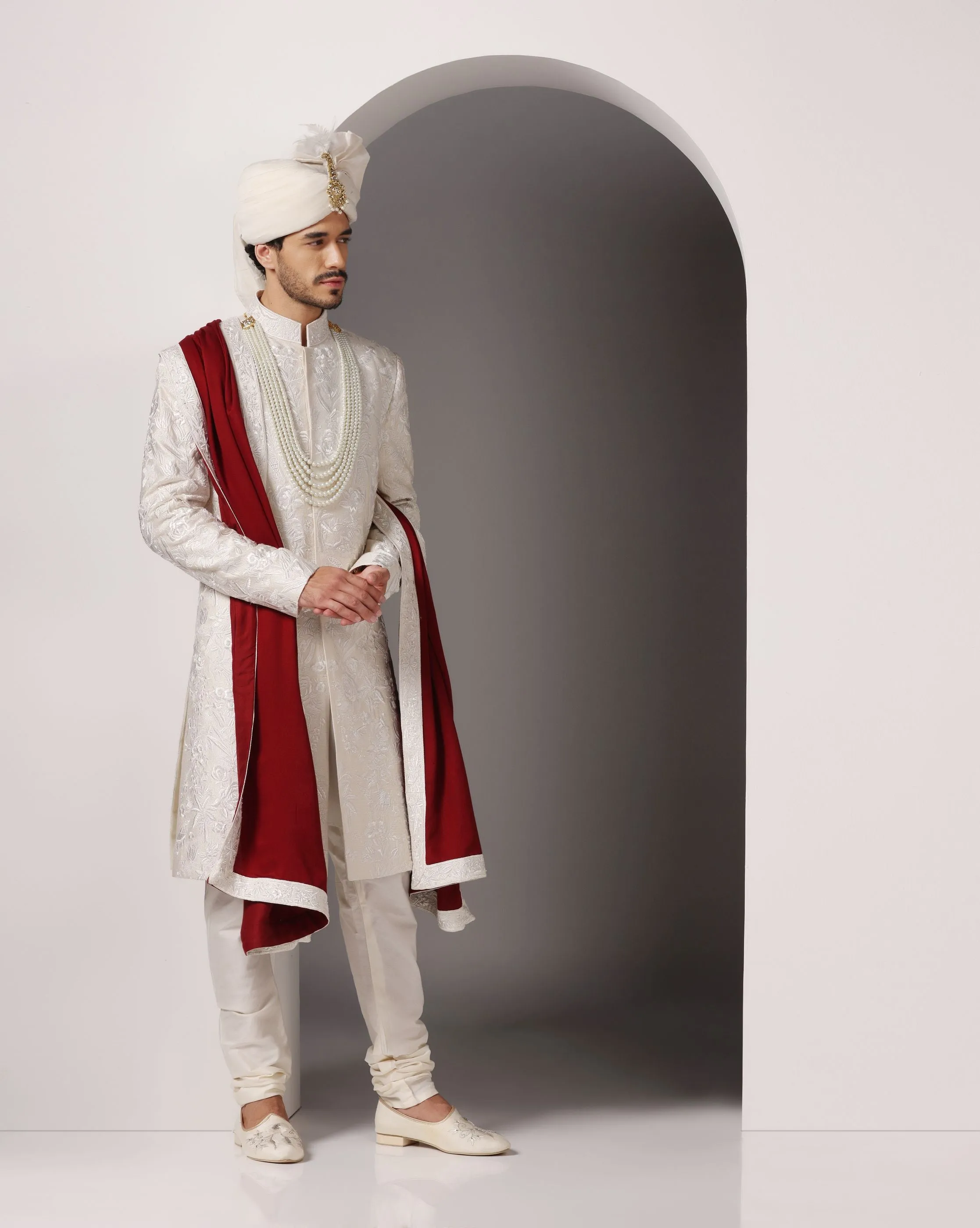 Ivory Grandeur: Sherwani with Subtle Tone-on-Tone Work and Handcrafted Embellishments