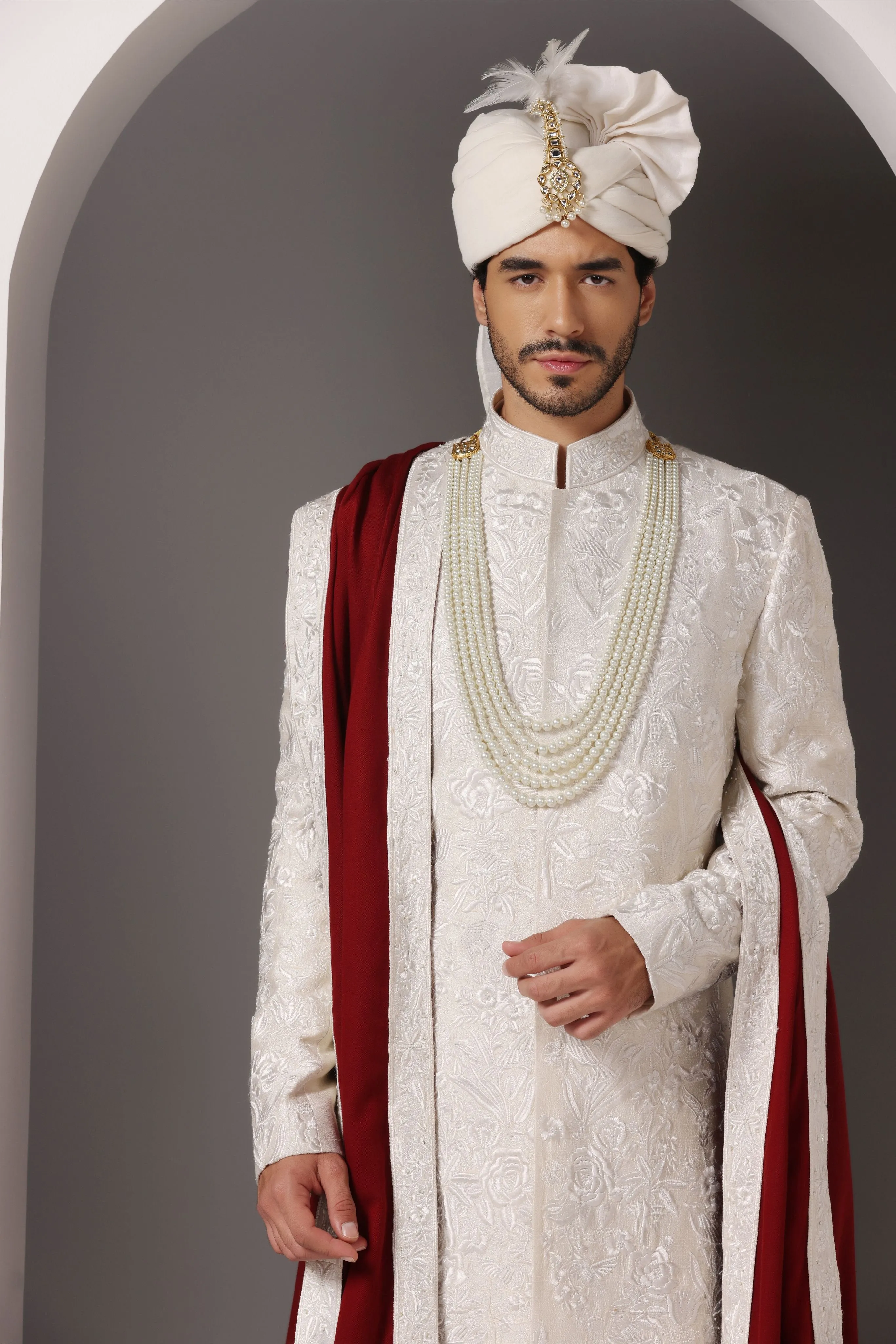 Ivory Grandeur: Sherwani with Subtle Tone-on-Tone Work and Handcrafted Embellishments