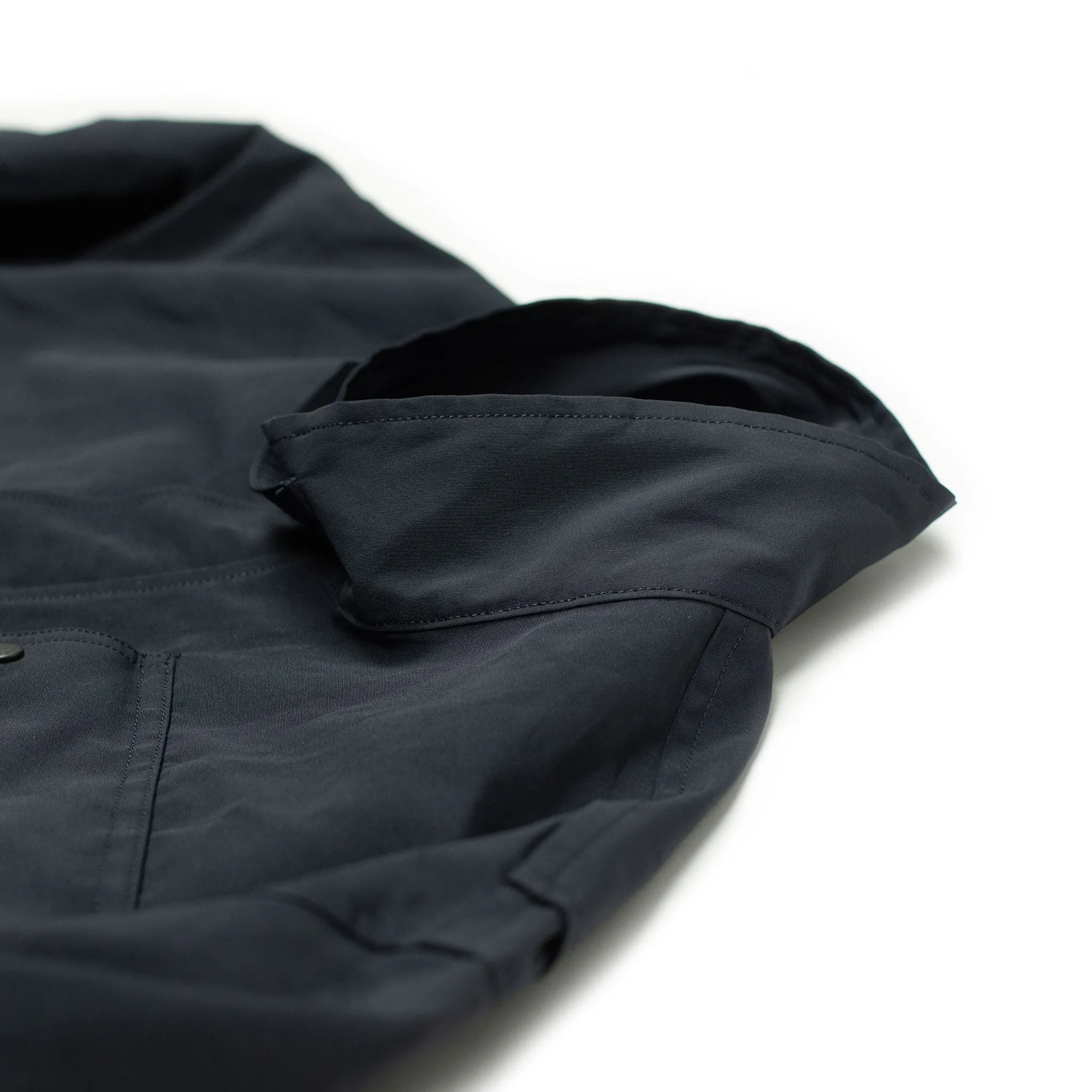 Photographer jacket in navy water-resistant polyester and paper