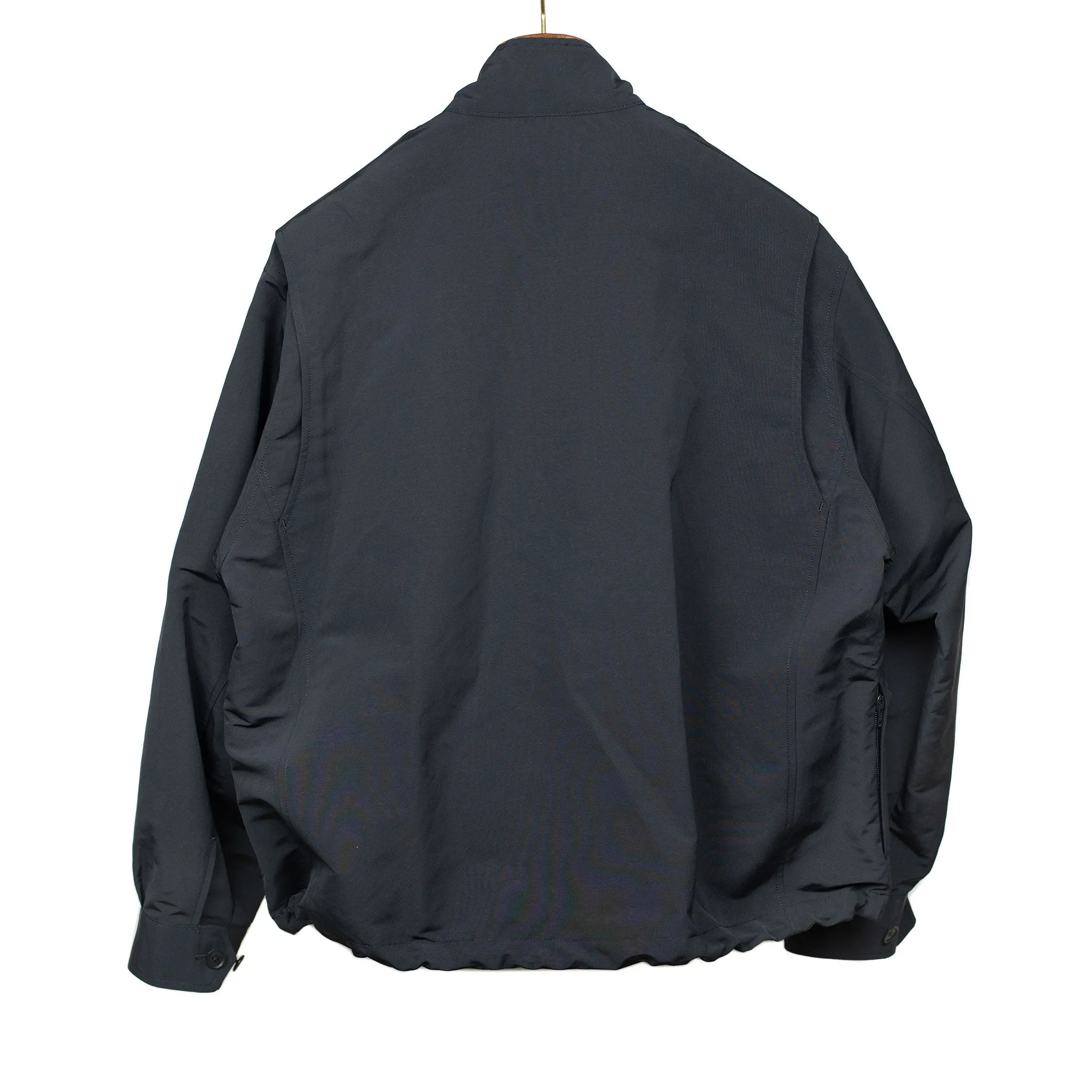 Photographer jacket in navy water-resistant polyester and paper