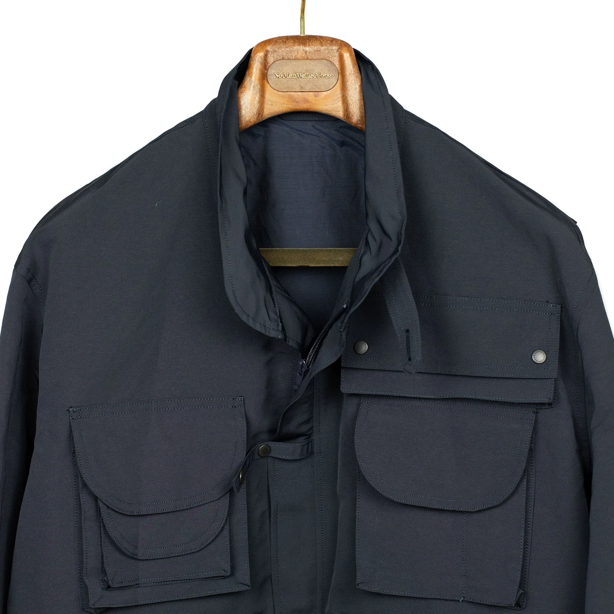 Photographer jacket in navy water-resistant polyester and paper