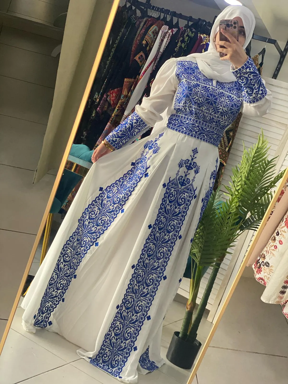 Royal White Dress with Unique Blue Embroidery and Long Tail