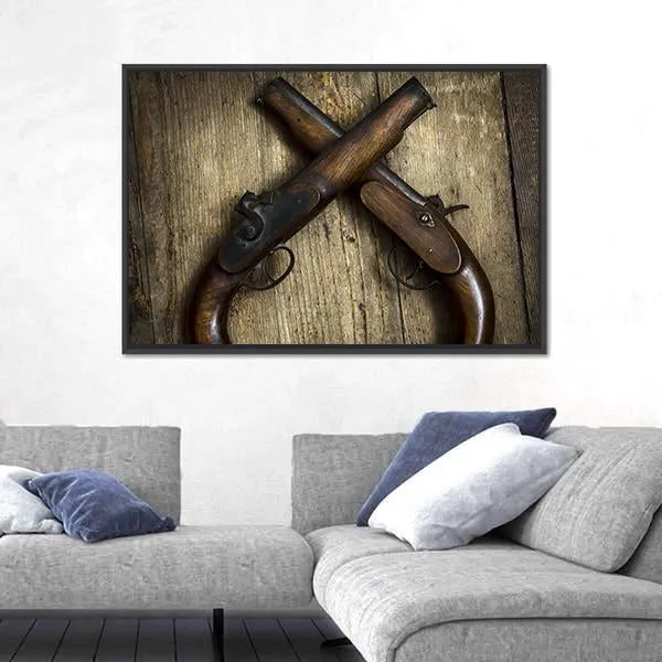 Two Vintage Pistols On Wooden Table Canvas Wall Art