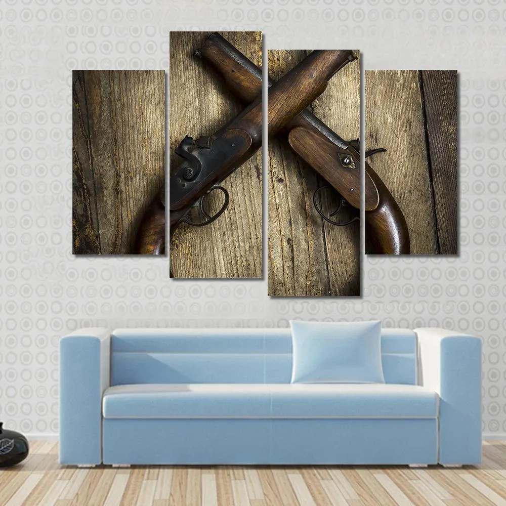 Two Vintage Pistols On Wooden Table Canvas Wall Art