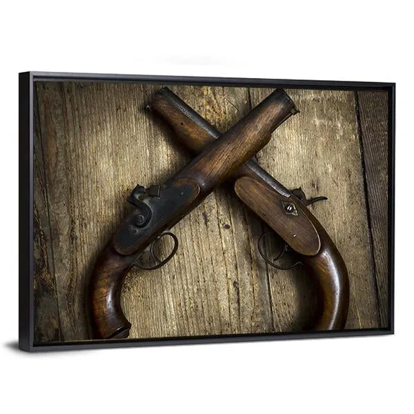 Two Vintage Pistols On Wooden Table Canvas Wall Art