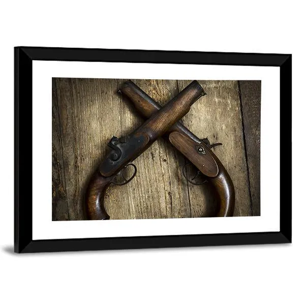 Two Vintage Pistols On Wooden Table Canvas Wall Art