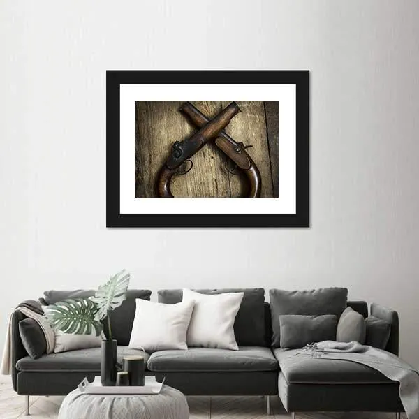 Two Vintage Pistols On Wooden Table Canvas Wall Art