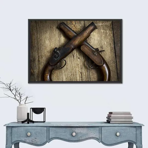 Two Vintage Pistols On Wooden Table Canvas Wall Art